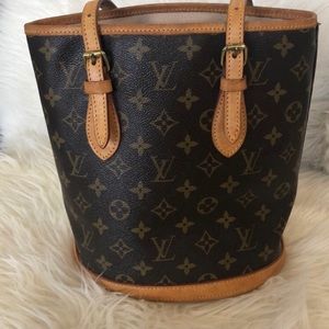 SOLD. Authentic Louis Vuitton PM Bucket Bag.
